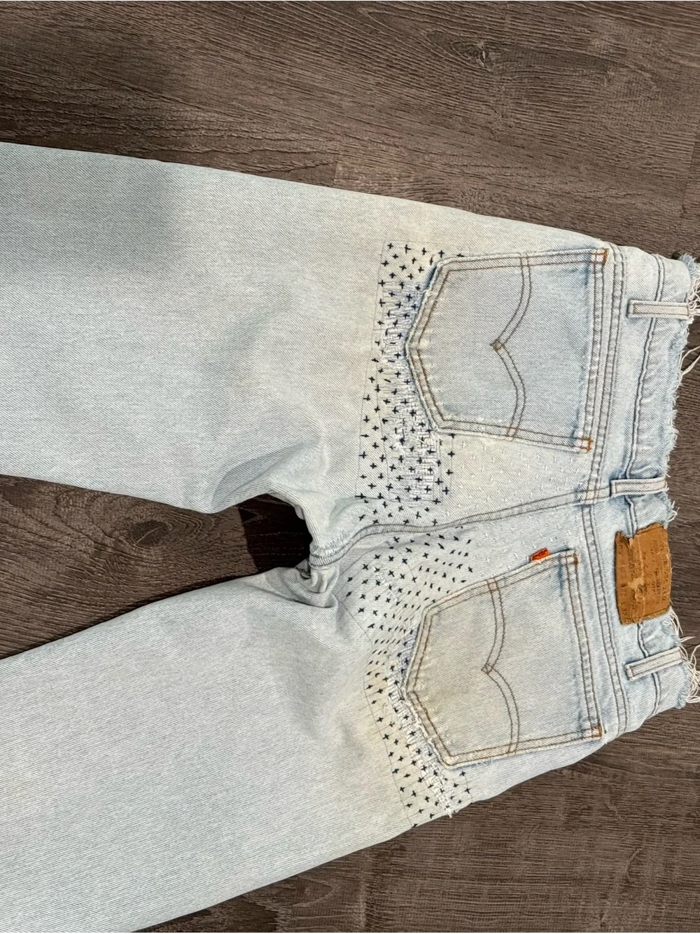 Vintage orange tab Y2K Light Blue Distressed Men’s Jeans with Patch Detail
